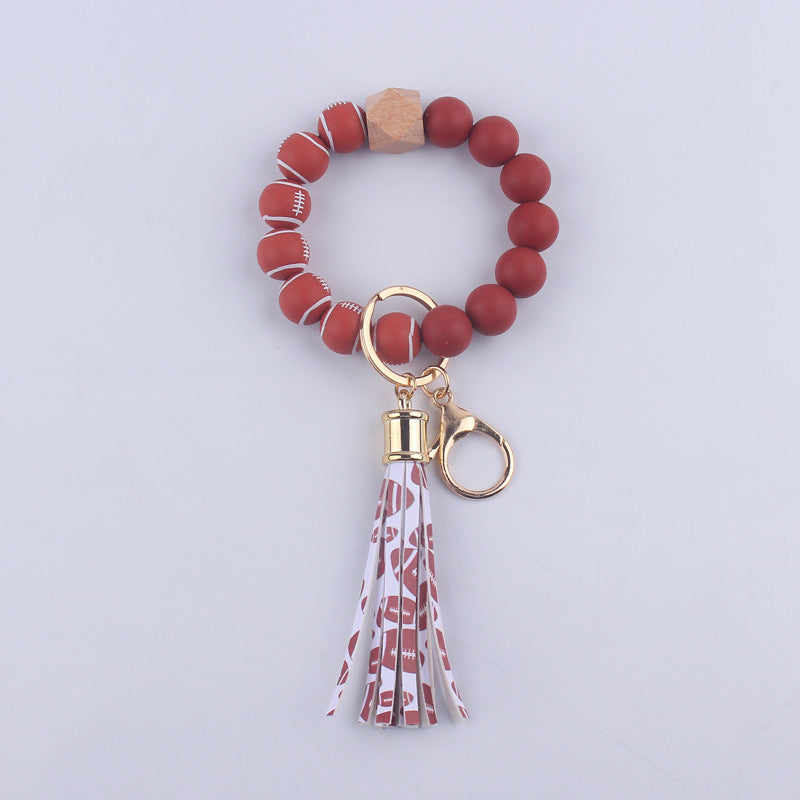 Llavero de muñeca con cuentas de silicona de fútbol al por mayor